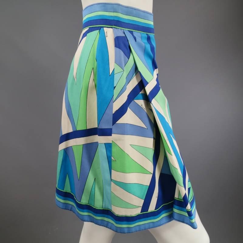 This fabulous vintage EMILIO PUCCI skirt comes in a gorgeous signature print cotton and features a pleated front and striped waist band and trim. Matching Blouse sold separately. Made in Italy.
 
Very Good Pre-Owned Condition.
 
Measurements:
