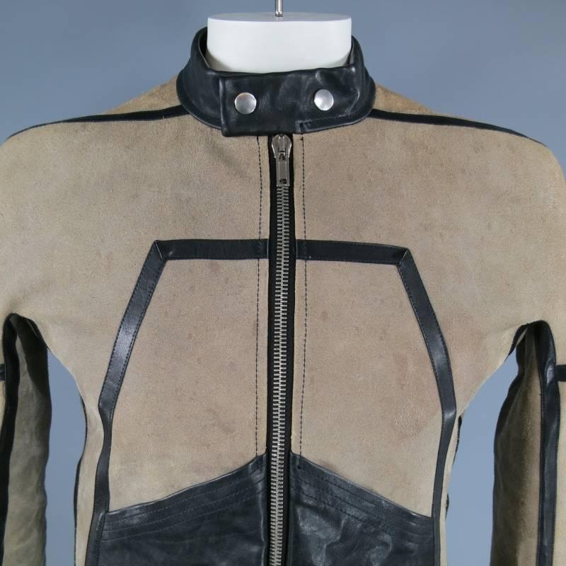 RICK OWENS Jacket consists of suede/ leather material in a taupe and black color tone. Designed with a zipper front in silver, collar snaps, black leather trimming throughout body and cuffs. Zipper cuff opening, tone-on-tone stitching on leather