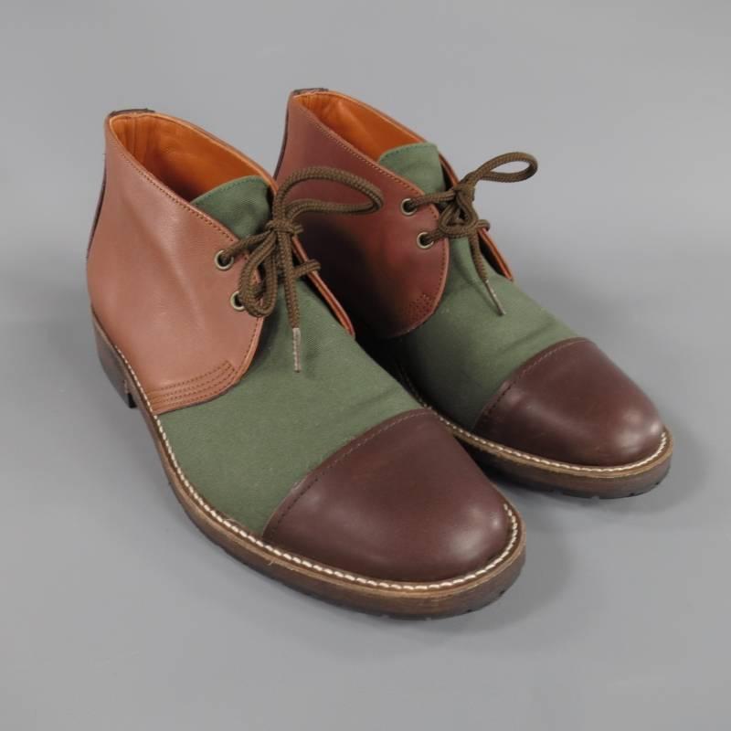 These JUNYA WATANABE MAN chukka boots feature tan leather upper panel, olive khaki green canvas mid section, brown leather toe cap, and brown and black sole. With Box. Made in Japan.
 
Excellent Pre-Owned Condition.
Marked: S
 
Measurements:
