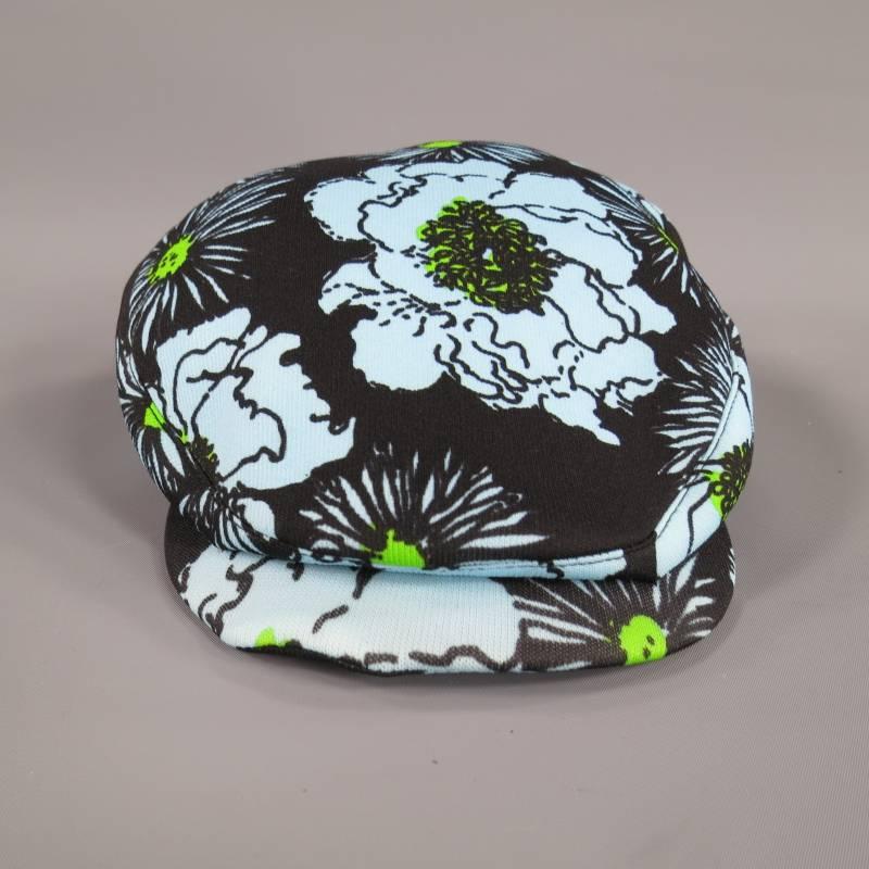This PRADA Spring Summer 2012 Menswear Collection brimmed golf hat comes in a retro black, light blue and green floral print nylon with satin lining. Made in Italy.
 
Excellent Pre-Owned Condition.
Marked: S

Item ID: 58332
