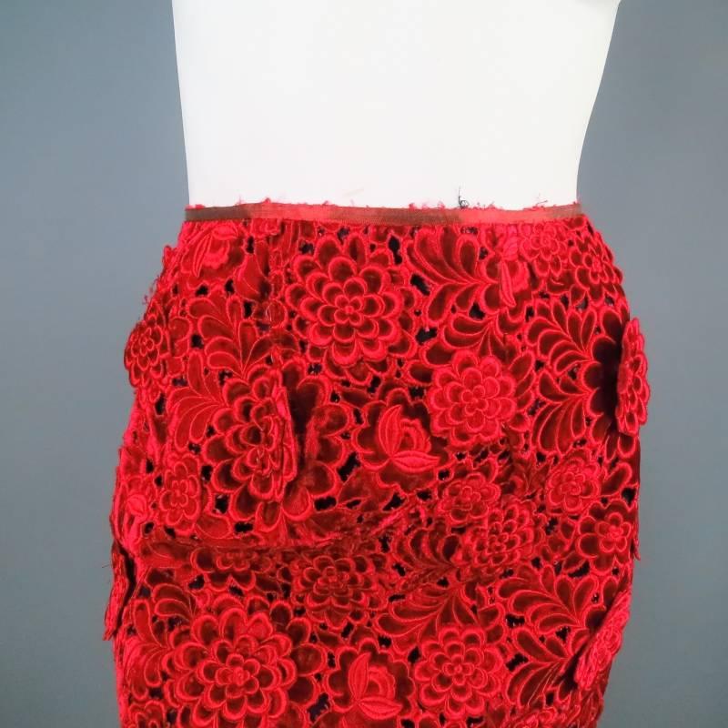 Stunning pencil skirt by MARC JACOBS. In a beautiful wine red lace with velvet texture and embroidered appliques, lined in black silk with exposed back zipper detail. Made in USA. Retails: $3,900.00
 
Brand New With Tags.
 
Measurements:
