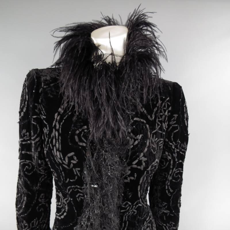This stunning evening coat by OSCAR DE LA RENTA comes in black velvet with textured woven ribbon paisley print and features a high collar with ostrich feather trim and sequin lace fringe. Made in USA.
 
Very Good Pre-Owned Condition.
Marked: Size