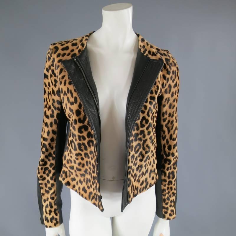 This fabulous A.L.C. biker jacket comes in tan leather cheetah leopard print pony hair leather and features a round, collarless neck, hidden zip closure, zip sleeves, and ribbed black leather panels. Made in USA.
 
Excellent Pre-Owned