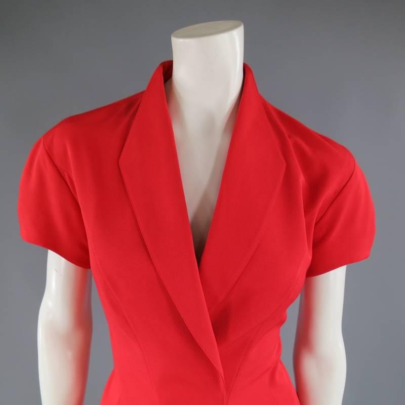 This fabulous MUGLER jacket comes in a brilliant red structured material and features a unique minimal diamond collar, short cap sleeves, curves slit pockets, and velcro closure. Made in France.
 
Excellent Pre-Owned Condition.
Marked: 38
