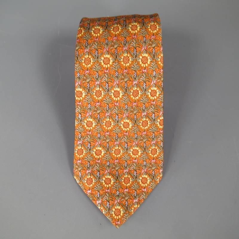 HERMES neutral tone tie set includes 2 100 % silk ties featuring Marigolds and Agave by Sunrise and Sunset in light tan and sunset orange.  Made in France.

Excellent Pre- Owned Condition.

Marked As: 7672 TA