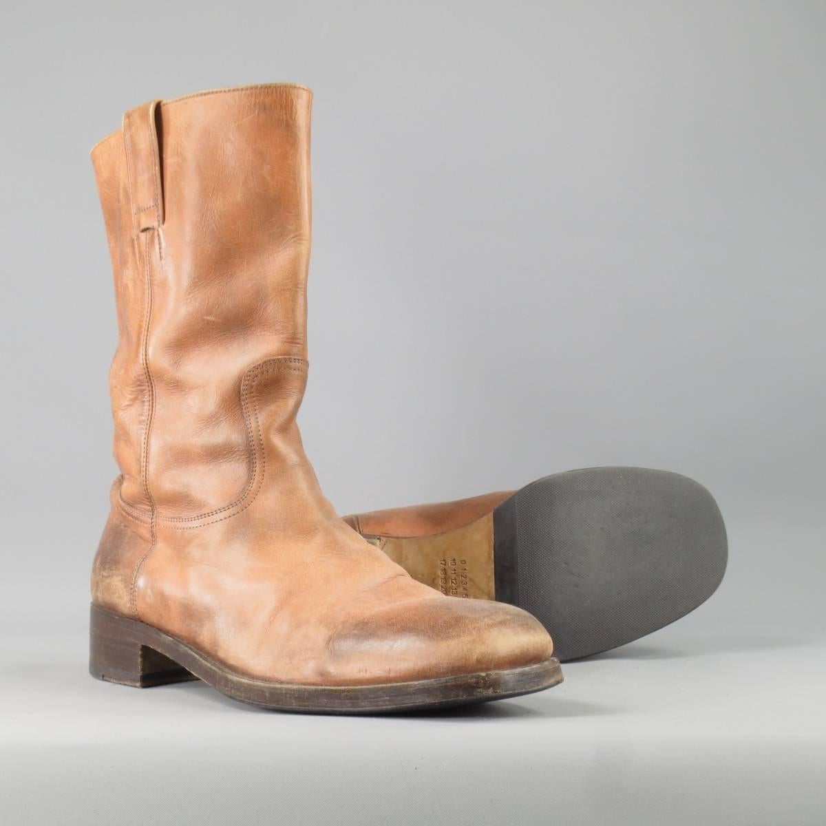 MAISON MARTIN MARGIELA rust brown workman boots feature artisan intentional distressing along a genuine leather upper and pull loop tabs along the rise of the boot, made in Italy.
 
Excellent Pre-Owned Condition    Marked: 44
 
Measurements:
