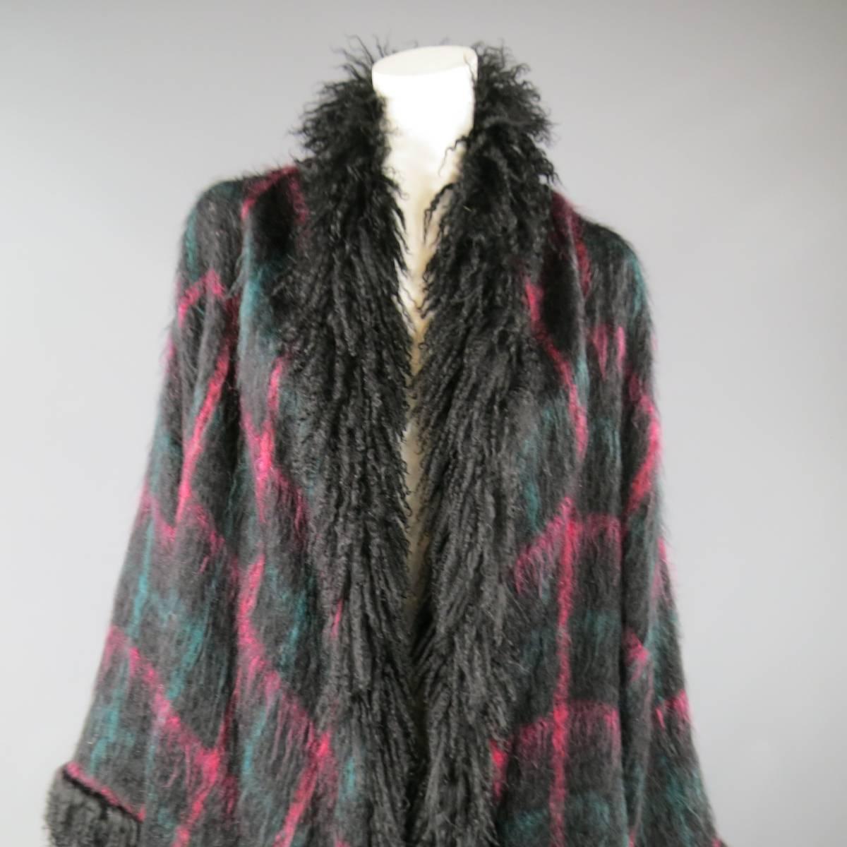 This fabulous JEAN-LOUIS SCHERRER oversized cardigan coat comes in a black mohair knit with pink and teal windowpane plaid print in a draped silhouette with black Mongolian lamb fur trim.
 
Very Good Pre-Owned Condition.
 
Measurements:
