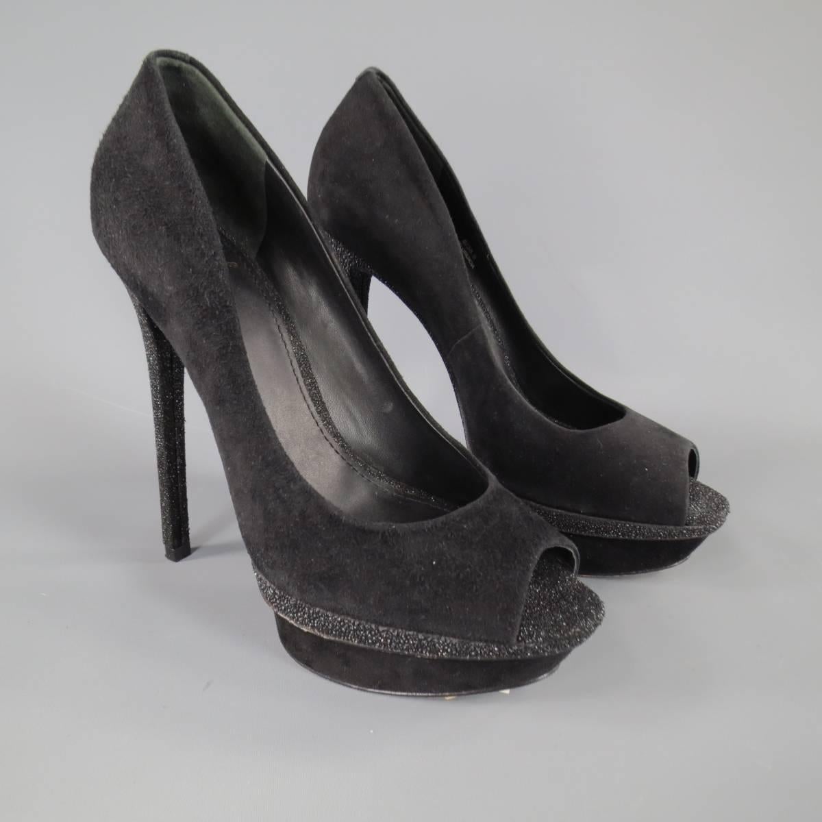 These fabulous B by BRIAN ATWOOD pumps come in black suede with a stacked platform, peep toe, and long glitter stiletto heel.
 
Excellent Pre-Owned Condition.
Marked: 8
 
Measurements:
 
Length: 10 in.
Width: 3.25 in.
Platform: 1.25