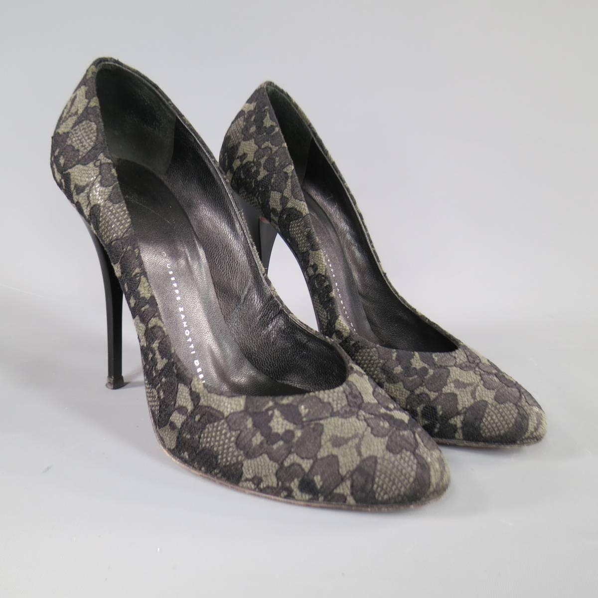 These sexy GIUSEPPE ZANOTTI pumps come in charcoal grey with black lace overlay with a high matte lacquered stiletto heel. Made in Italy.
 
Very Good Pre-Owned Condition.
Marked: 37.5
 
Measurements:
 
Heel: 3 in.
Width:  4.5 in.
