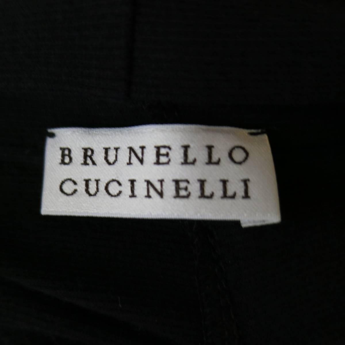 This fabulous BRUNELLO CUCINELLI top comes in a black ribbed stretch cotton and features a draped V neck wrap bodice with sheer chiffon sleeves. Made in Italy.
 
Excellent Pre-Owned Condition.
Marked: M
 
Measurements:
 
Shoulder: 18