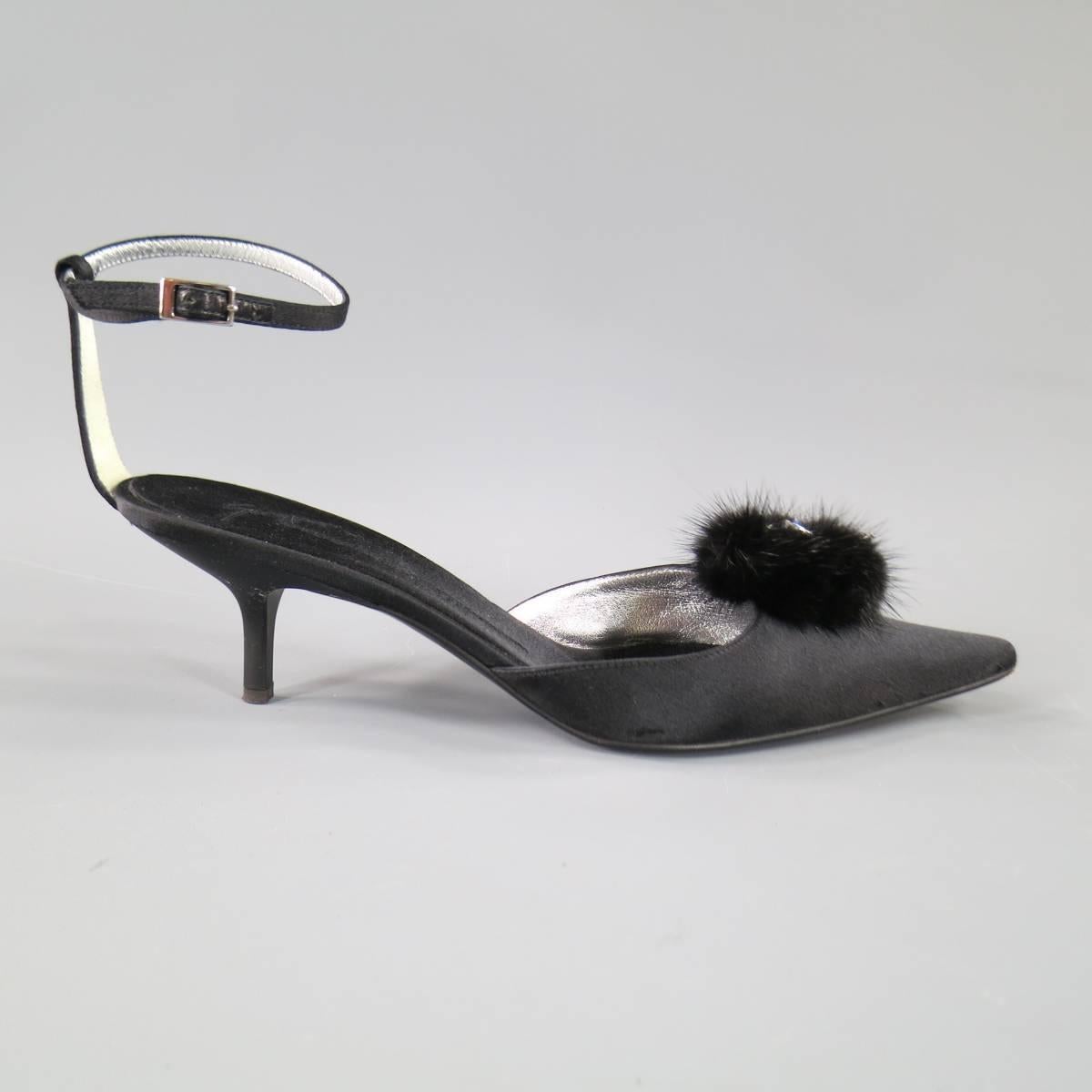 These fabulous GIUSEPPE ZANOTTI evening pumps come in black satin and feature a pointed toe with black fur and clear sparkling crystal drop embellishment, low matte kitten heel, and ankle strap. Made in Italy.
 
Excellent Pre-Owned