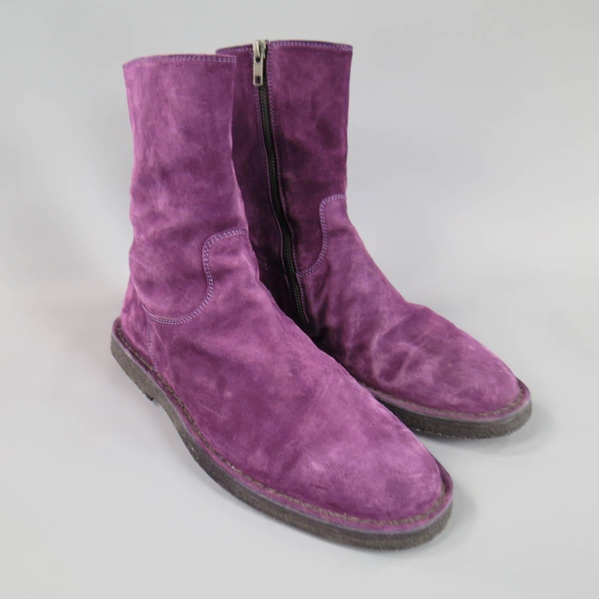 ANN DEMEULEMEESTER Boots consists of suede material in a purple color tone. Designed in a round-toe front, high ankle collar, tone-on-tone stitching along vamp and collar. Detailed with a side-zipper opening and leather lining. Crepe sole.
 
Good