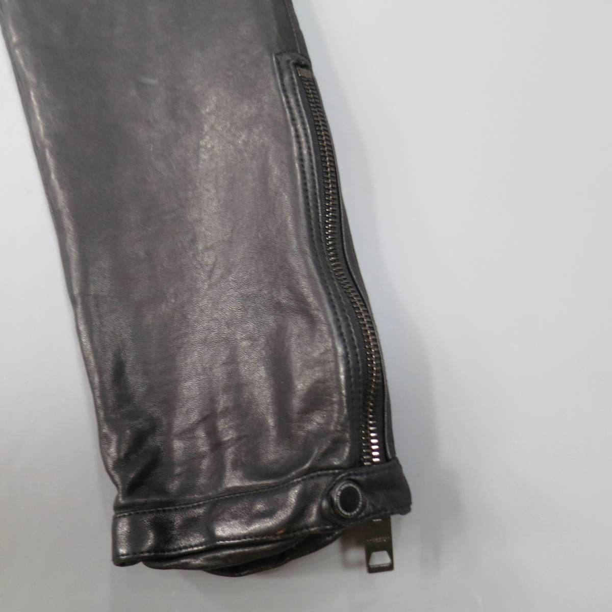 Burberry Prorsum Pants consists of 100% leather material in a black color tone. Designed in a biker style look, tone-on-tone stitching can be seen throughout body of pant with rib knee patches and detailed zig-zag's around the mid-section. Leg is