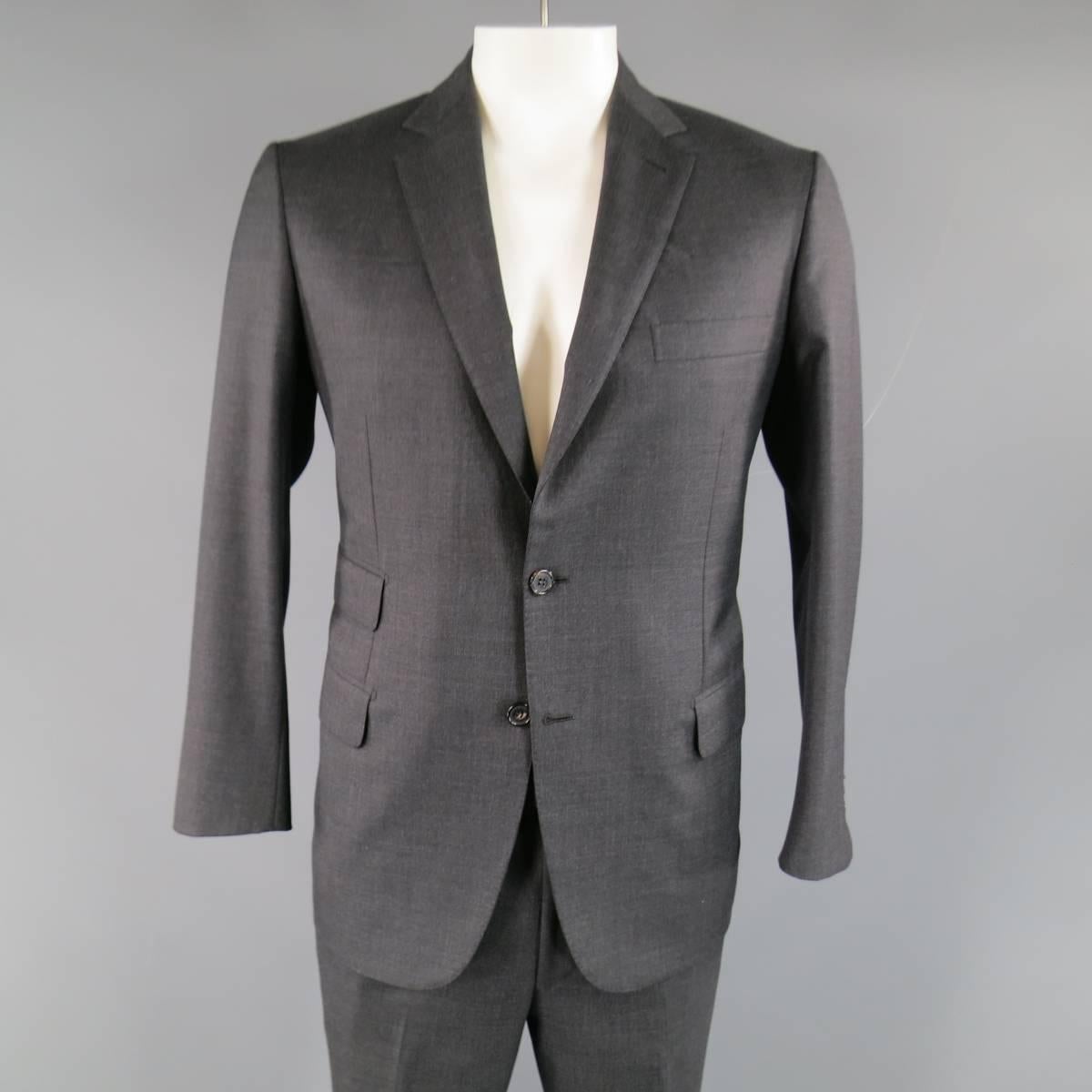 Modern Classic BRIONI for WILKES BASHFORD two piece suit in charcoal textured wool includes a two button, notch lapel sport coat with triple flap pockets, functional button cuff sleeves, and double vented back with matching flat front, cuffed hem