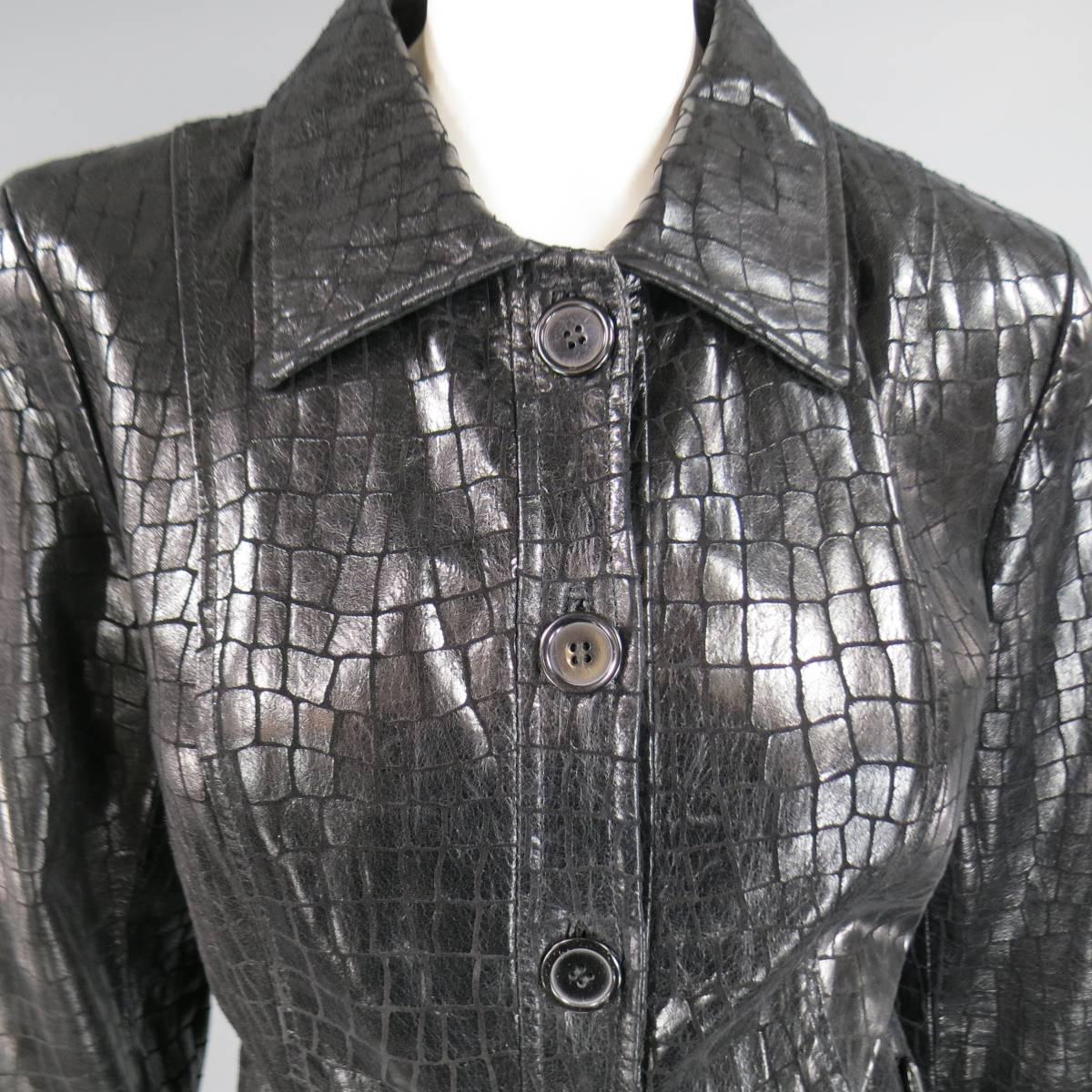 This fabulous NEIMAN MARCUS Exclusive jacket comes in a high shine, crocodile print leather and features a pointed collar, single breasted four button closure, patch flap pockets, and slight peplum silhouette.
 
Excellent Pre-Owned