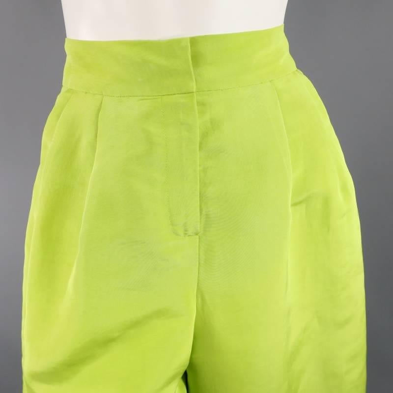 These fabulous Resort 2008 Collection dress pants by OSCAR DE LA RENTA come in a light green semi matte, structured silk and feature a high rise, pleated front, side pockets, and dramatic wide leg with cuffed hem. Perfect for a semi formal occasion