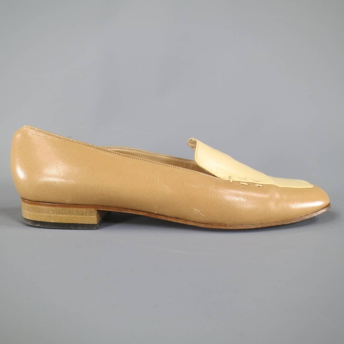 Fabulous vintage CHANEL color block loafers in tan and beige leather with a squared off pointed toe, low heel, and embroidered logo detail. Made in Italy.

Good Pre-Owned Condition.
Marked: IT 40

Heel: 0.75 in.