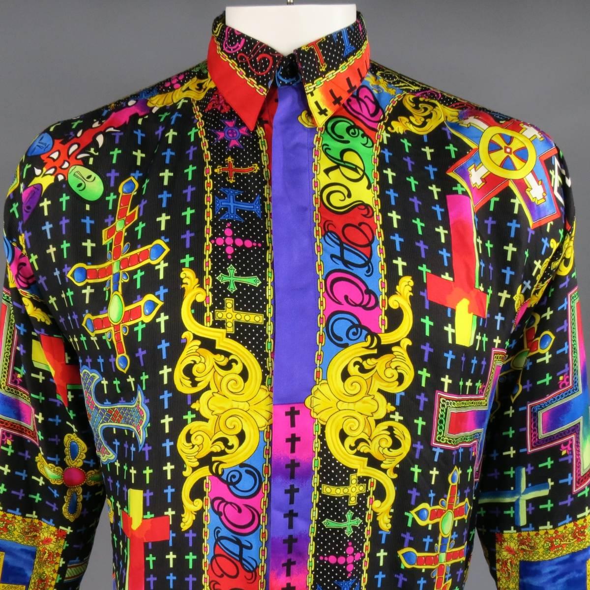 VINTAGE GIANNI VERSACE Long Sleeve Shirt consists of silk material in a multi-color tone. Designed with a button-down double layer collar, hidden button trim and iconic VERSACE print throughout shit. Detailed with multi-colored crosses, novelty gold