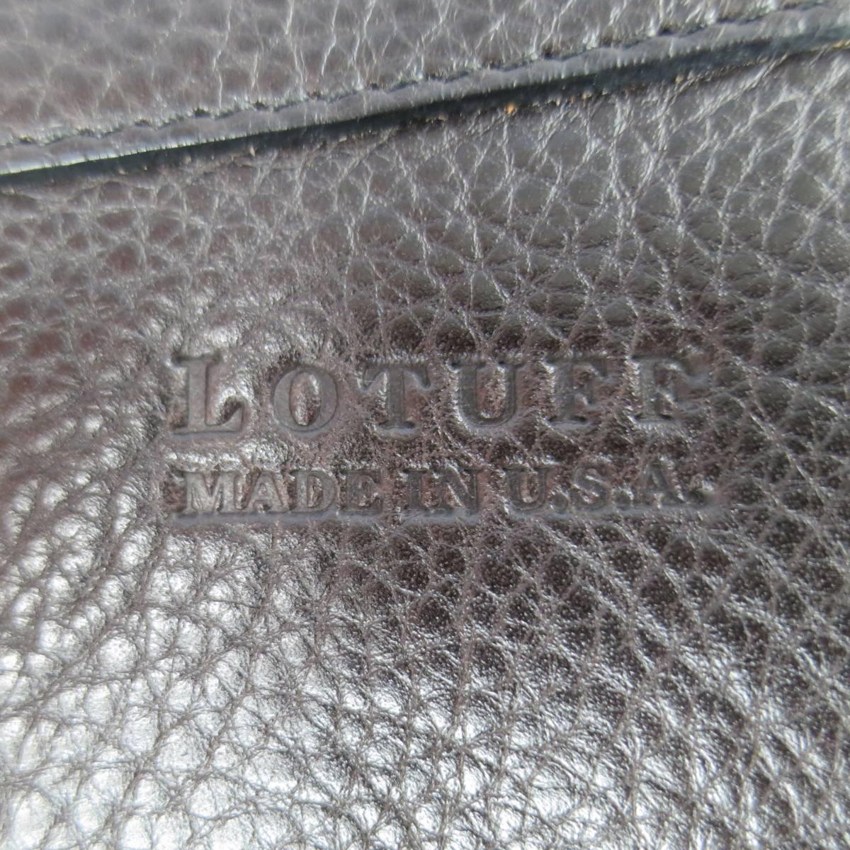 Classic envelope portfolio clutch by LOTUFF in rich chocolate brown textured leather with a fold over flap closure. Made in USA.
 
Excellent Pre-Owned Condition.
 
Length: 15 in.
Width: 2 in.
Height: 12 in.