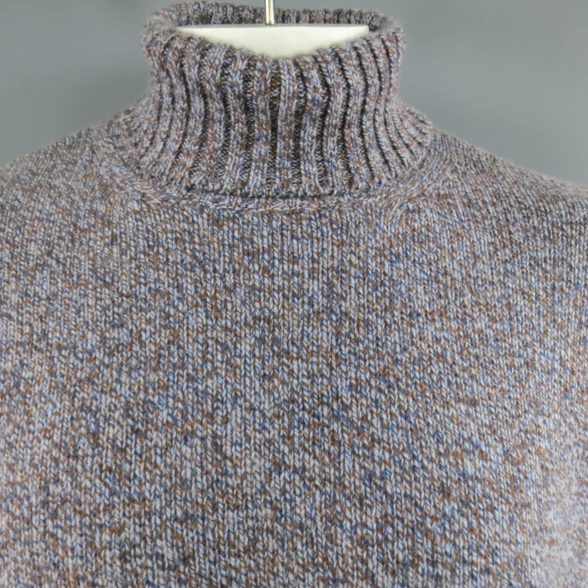 LORO PIANA Sweater consists of 100% cashmere material in a blue and brown color tone. Designed in a turtle-neck style, heather knit pattern throughout body. Detailed with rib cuff's and hem. Made in Italy.
 
Excellent Pre-Owned Condition
Marked