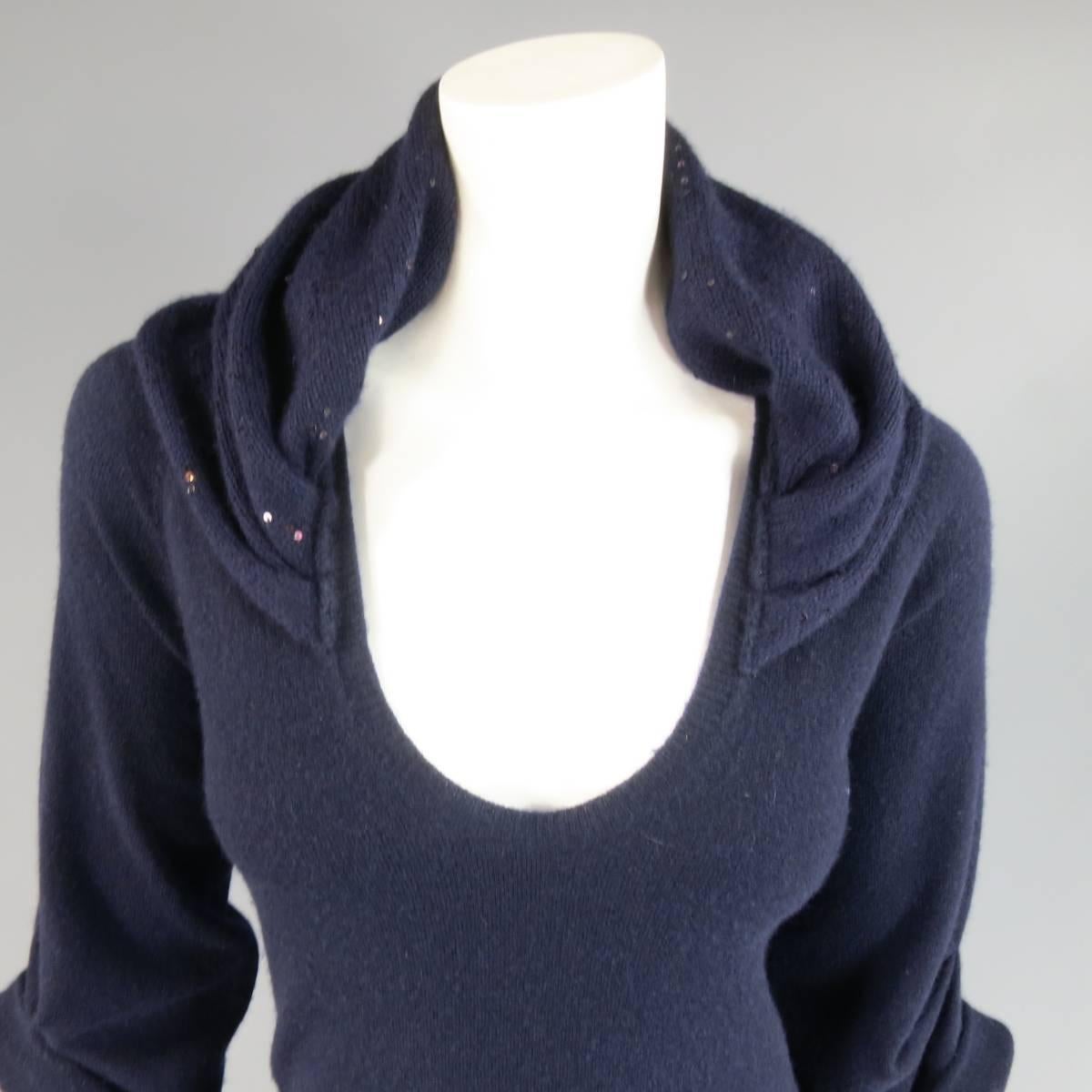 Lovely BRUNELLO CUCINELLI sweater dress in navy blue cashmere knit featuring an A line silhouette, three quarter gathered cuff sleeves, slit pockets, and V neck line with ruched sequin collar. Made in Italy.
 
Excellent Pre-Owned