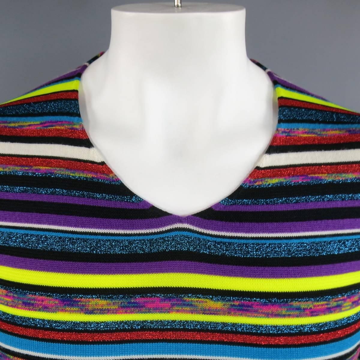 Unique COMME DES GARCONS SHIRT pullover V neck sweater in a unique textured striped knit with accents of purple, cream, black, and yellow with red and blue Lurex sparkle knit accents. Made in Japan.
 
Excellent Pre-Owned Condition.
Marked: S
