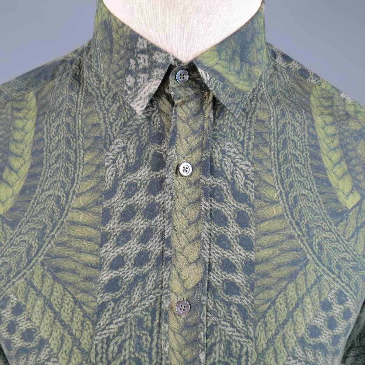 Chic MCQ by ALEXANDER MCQUEEN pointed collar, button up dress shirt comes in a light weight cotton with all over symmetrical braided ropes print in shades of green with Mcq logo embroidered on back.
 
Excellent Pre-Owned Condition.
No size tag.