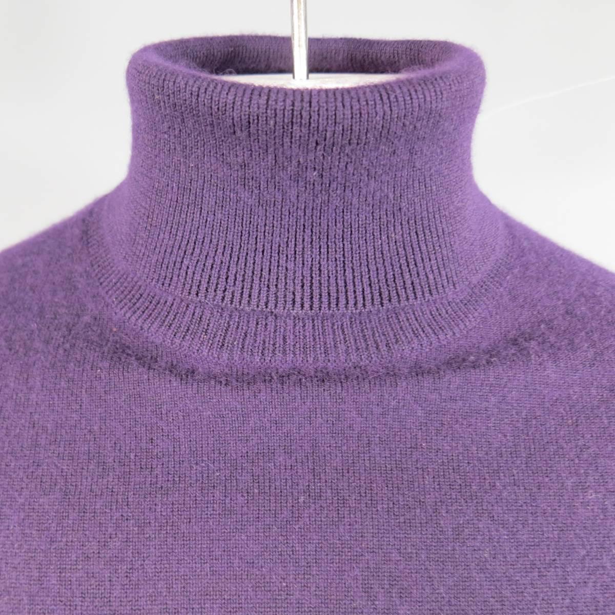 Classic RALPH LAUREN PURPLE LABEL turtleneck pullover sweater in a rich eggplant purple cashmere. Made in Italy.
 
Excellent Pre-Owned Condition.
Marked: XL
 
Measurements:
 
Shoulder: 21 in.
Chest: 48 in.
Sleeve: 27 in.
Length: 29 in.