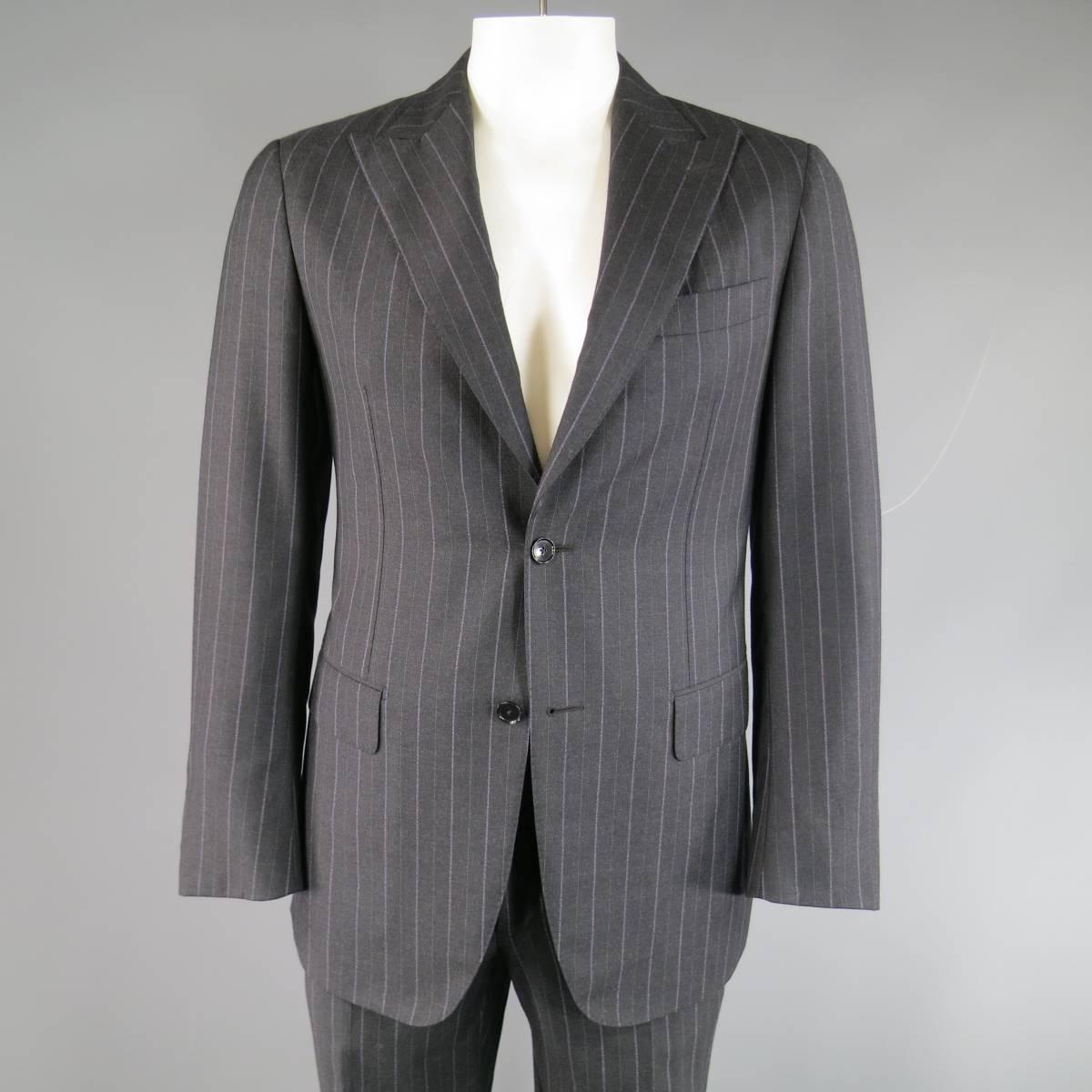 Classic PAL ZILERI suit in a charcoal gray wool cashmere blend with all over lavender chalk-stripe print includes a two button sport coat with wide peak lapel, flap pockets, functional button cuffs, and double vented back and matching tailored, flat