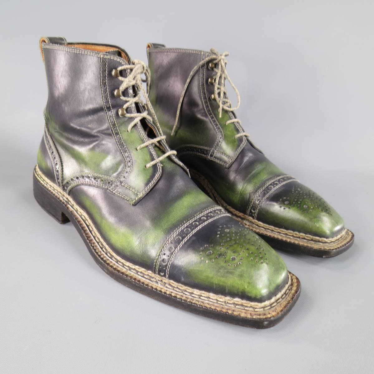 These unique BETTANIN & VENTURI dress boots come in a custom distressed and dyed black & green leather and feature a square toe with toe cap, contrast stitching, and perforated brogue details throughout. Made in Italy.
 
Excellent Pre-Owned