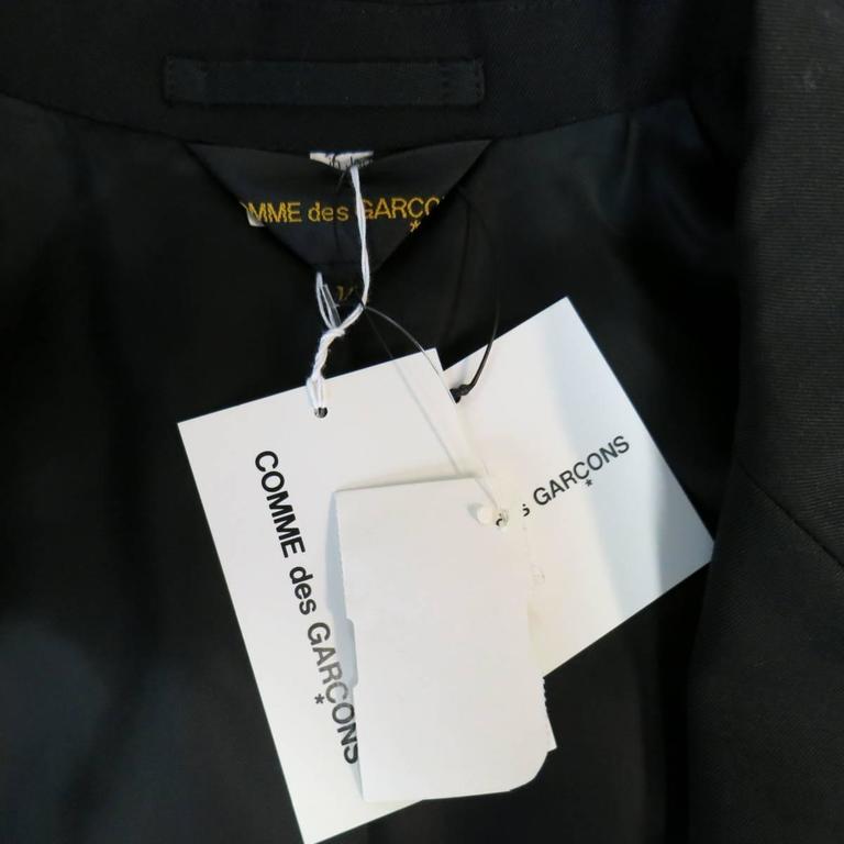 comme des garcon tag