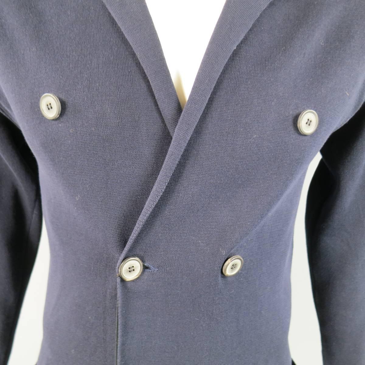 LANVIN cardigan jacket comes in a deep navy blue cotton knit and features a double breasted button up closure with ribbon liner, notch lapel, and double patch pockets. Made in Italy.
 
New with Tags.
Marked: L
 
Measurements:
 
Shoulder: 19