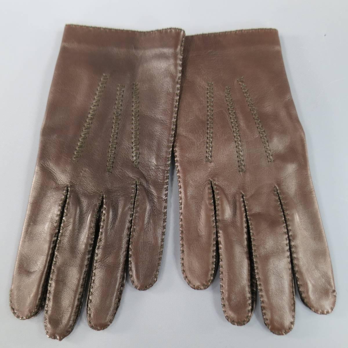 Vintage HERMES gloves in a rich chocolate brown lambskin leather with top stitching throughout. Made in France.
 
New without Tags. 
Marked: 8
 
Measurements:
Length: 9 in.
Width: 4 in.