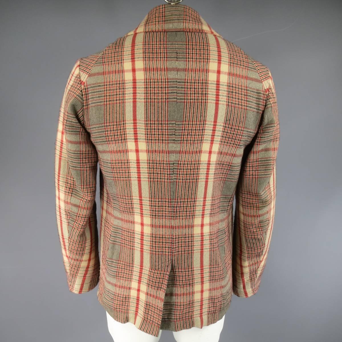 ALEXANDER MCQUEEN peacoat in a light weight, khaki and red glenplaid print, cotton wool featuring a double breasted closure, classic collar lapel, slit pockets, and quilted lining. Minor pilling throughout. Made in Italy.
 
Good Pre-Owned