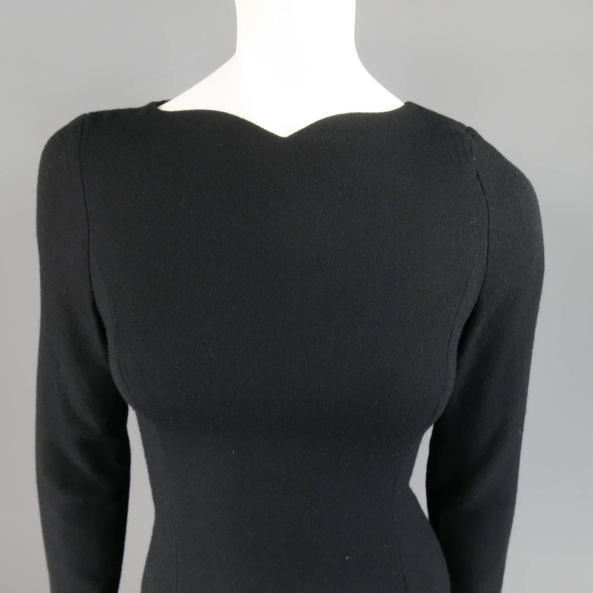 Vintage CH by CAROLINA HERRERA sheath dress in a wool blend crepe fabric featuring a high, curved neckline, long sleeves, satin lining, and oversized satin flower appliques along the hem.
 
Good Pre-Owned Condition.
Marked: US 4
