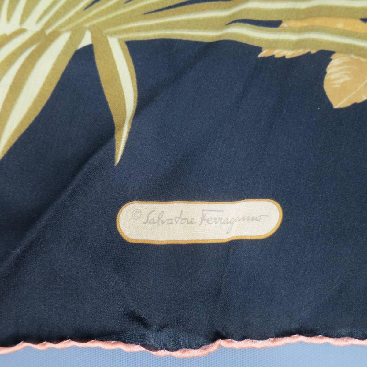 Vintage silk scarf by SALVATORE FERRAGAMO comes in an black &  green silk and features a tropical floral pattern golden tiger graphic print. Made in Italy.
 
Good Pre-Owned Condition
 
Measurements:
16 x 61 in.