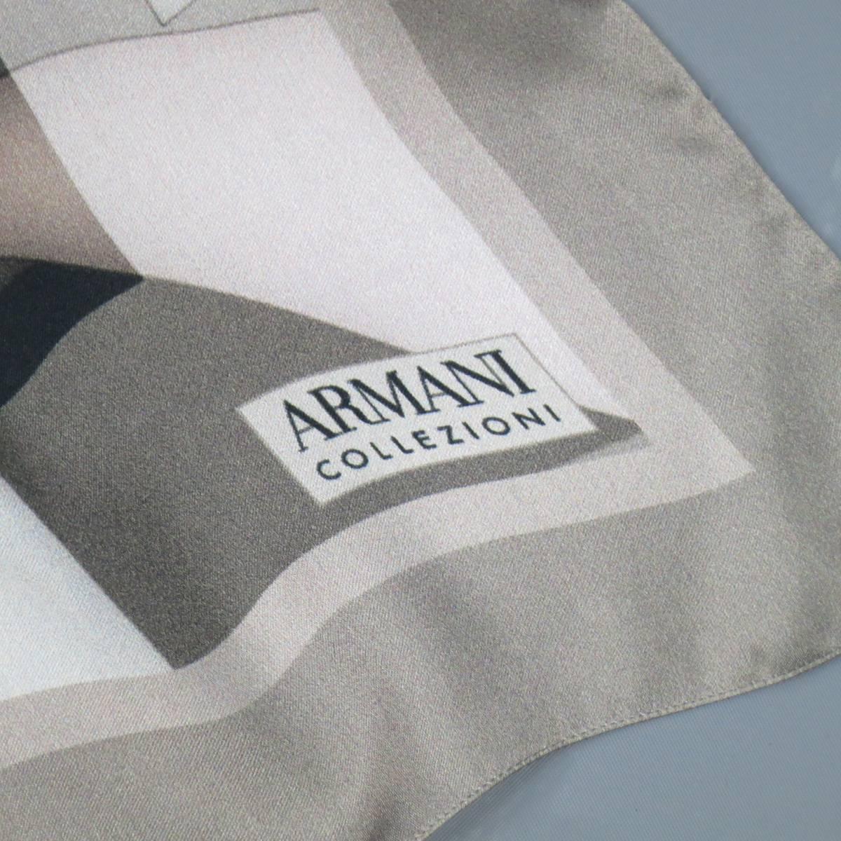 This ARMANI COLLEZIONI scarf comes in a sheer silk material with an abstract taupe and gray geometric pattern. Made in Italy.
 
Excellent Pre-Owned Condition
 
27 x 72 in.