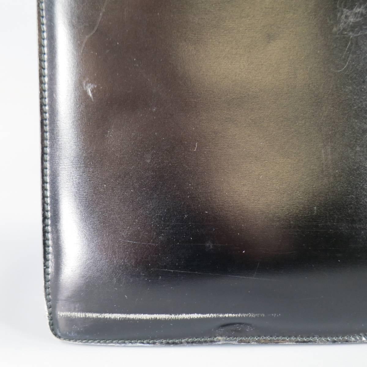 GUCCI Black Leather Top Handle Silver Combination Lock Briefcase In Fair Condition In San Francisco, CA