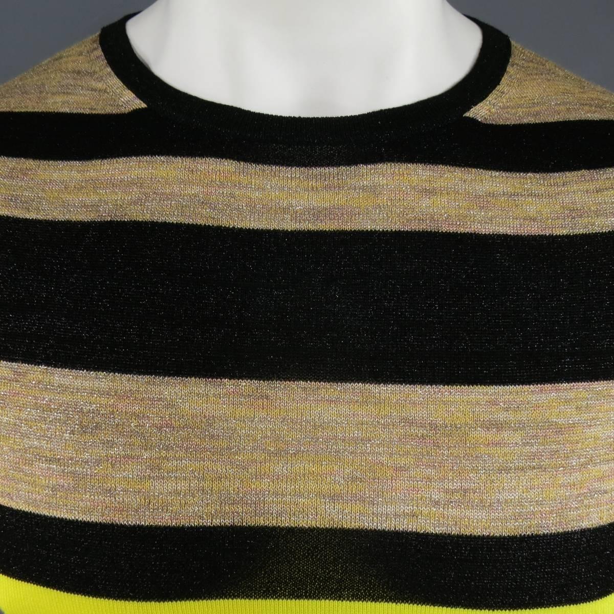 This DRIES VAN NOTEN pullover sweater comes in a light weight, semi sheer cotton blend knit featuring a black, gold, yellow, peach pink, teal, and green Heather Lurex sparkle stripe patter throughout. Made in Belgium.
 
Excellent Pre-Owned