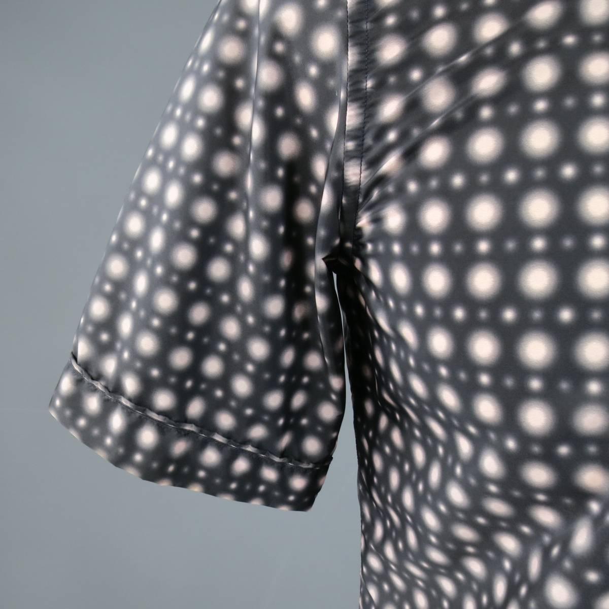 JIL SANDER short sleeved button up in charcoal and light pink Gerhard Richter "Strontium" shadow spot print poliamide windbreaker material with a pointed  collar and cuffed sleeve hem. Made in Italy.
 
Excellent Pre-Owned