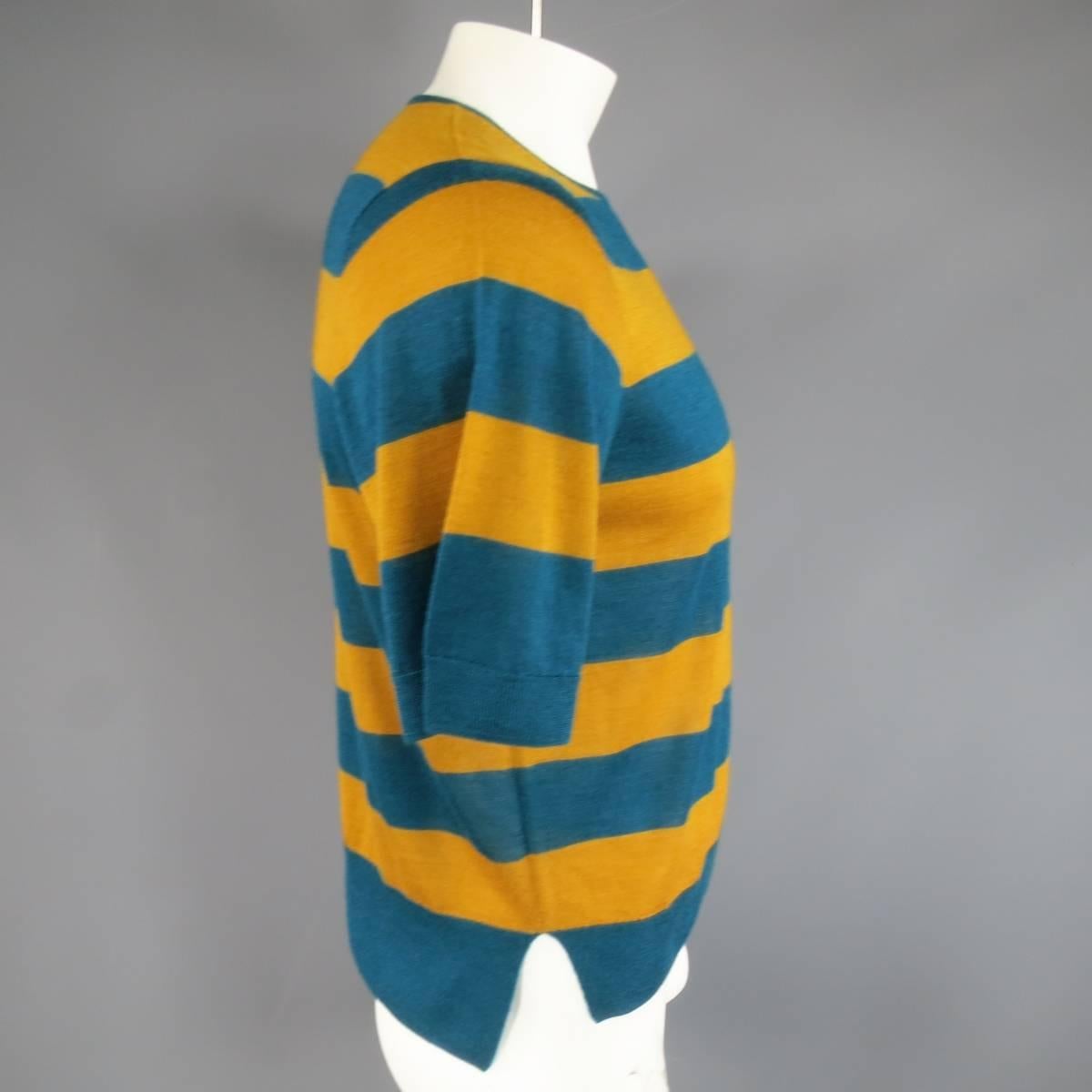 DRIES VAN NOTEN short sleeved pullover sweater in a light weight cashmere silk blend knit with crewneck and thick gold and teal striped pattern. Made in Belgium.
 
Excellent Pre-Owned Condition.
Marked: Large
 
Measurements:
 
Shoulder: 16