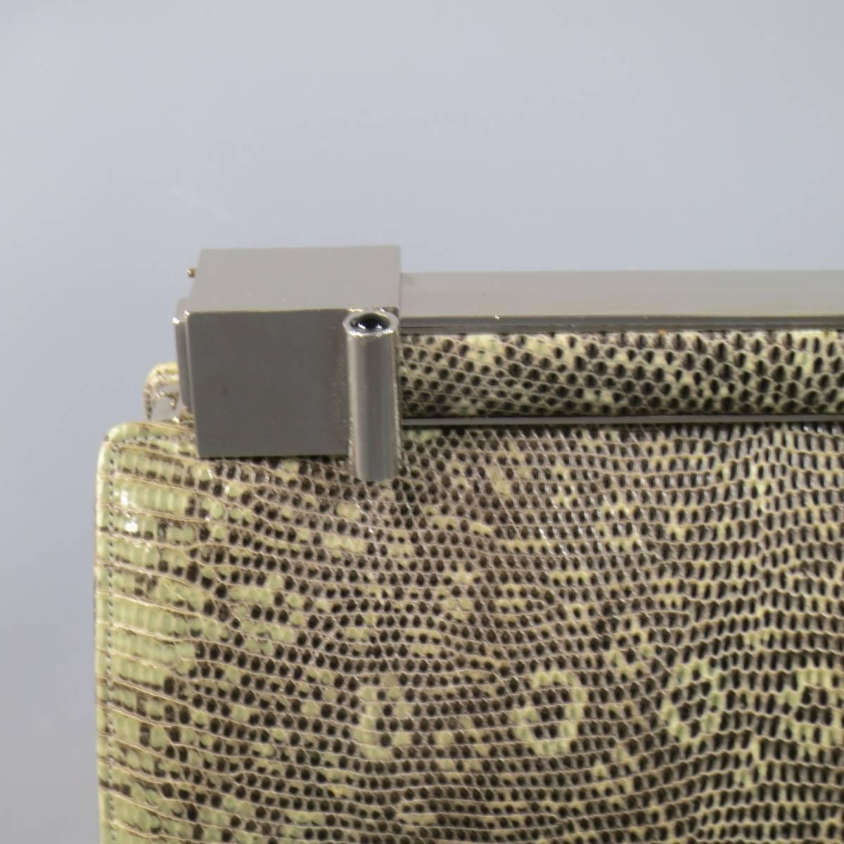 This gorgeous JUDITH LEIBER handbag comes in a light green snakeskin leather and features a structured shape, pleated side, and geometric silver tone metal clasp closure and includes a detachable shoulder strap, coin purse, and mirror. Wear on