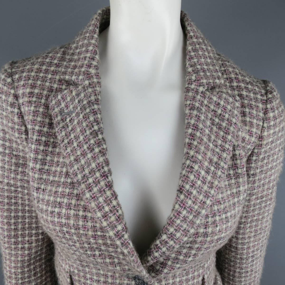 RED VALENTINO cropped blazer in gray, pink, and cream plaid wool blend tweed featuring a two button closure, peak lapel, back bow detail. Made in Italy.
 
Excellent Pre-Owned Condition.
Marked: USA 2
 
Measurements:
 
Shoulder: 15 in.
Bust: 36