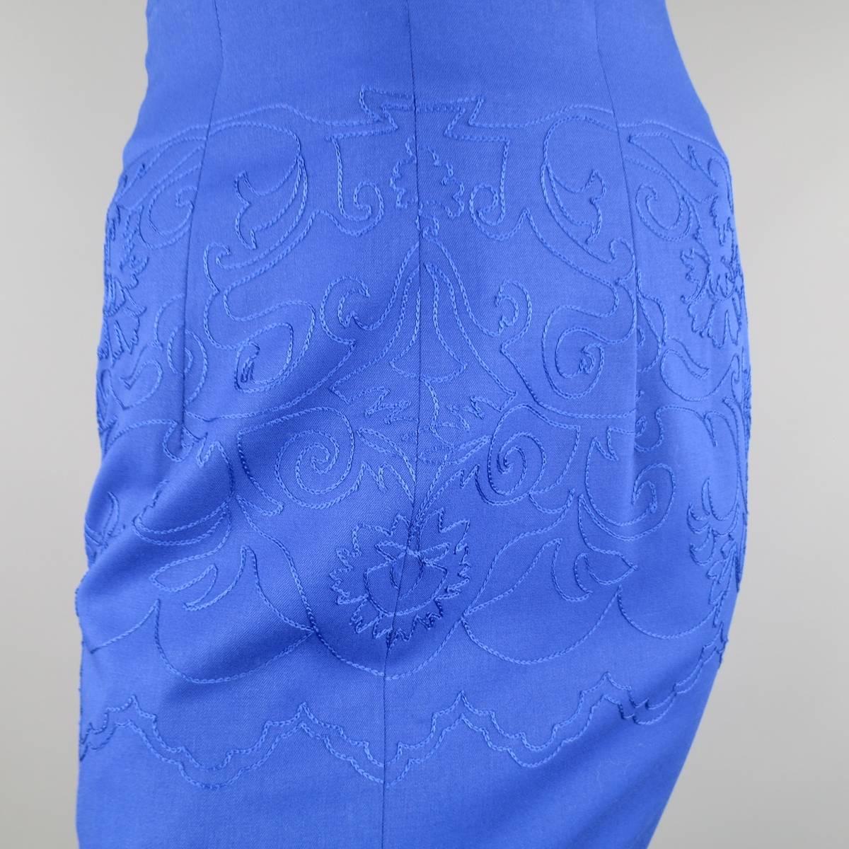 Vintage 1980's GIANNI VERSACE pencil skirt in a brilliant royal blue wool featuring an embroidered pattern through the mid section. Made in Italy.
 
Excellent Pre-Owned Condition.
Marked: 