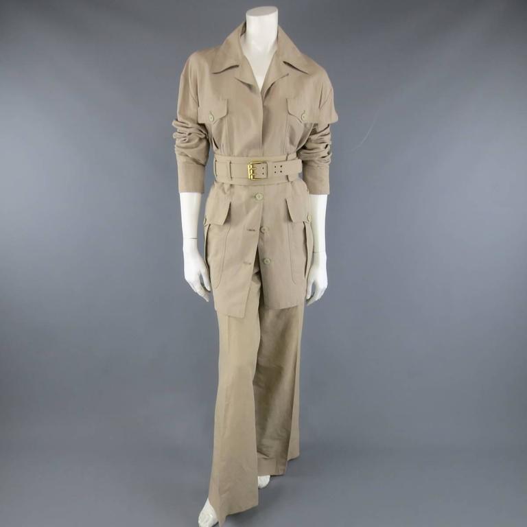 This fabulous STELLA MCCARTNEY pants set comes in a beige flax cotton blend and includes a patch pocket safari jacket, matching wide leg trousers and thick canvas statement belt.
 
Excellent Pre-Owned Condition.
Marked: 42
 
Jacket:
Shoulder: 22