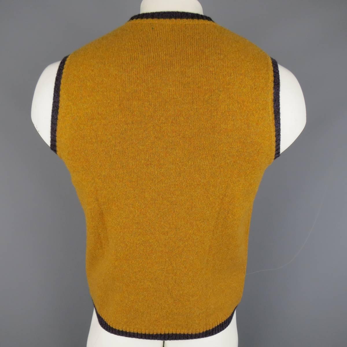 gold sweater vest