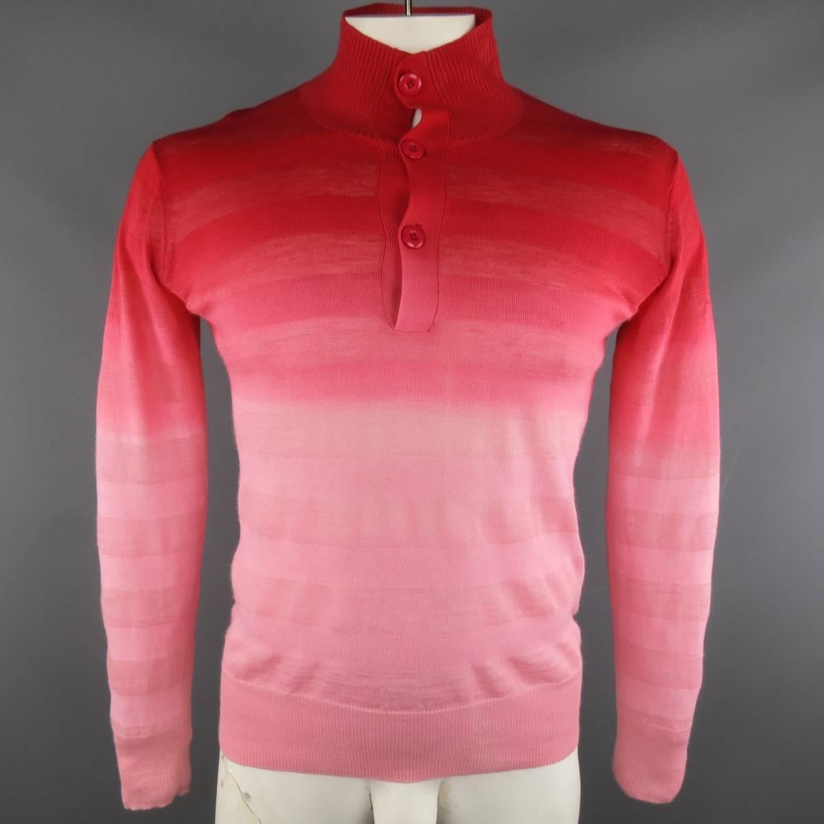 Y's by YOHJI YAMAMOTO Pullover consists of cotton material in a red color tone. Designed with a high collar, 3-button front, rib cuffs and hem. Detailed in a ombre color pattern in red and light pink. Made in Japan.
 
Good Pre-Owned Condition
