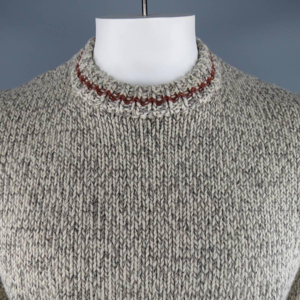 RRL by RALPH LAUREN Sweater consists of cotton/wool material in a cream color tone. Designed in a crew-neck collar, heather pattern with a heavy knit texture. Rib cuffs and hem.
 
Excellent Pre-Owned Condition
Marked Size: L
 
Measurements
