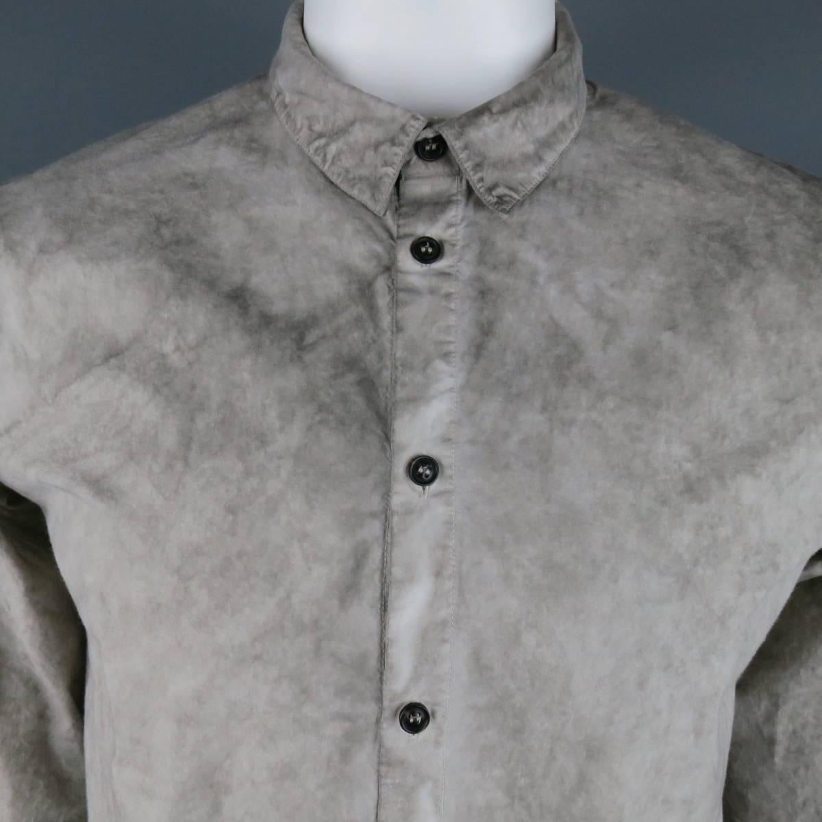 SILENT by DAMIR DOMA button up shirt in a gray marble dyed cotton bend with a pointed collar and all over distressing details. Made in Romania.
 
Excellent Pre-Owned Condition.
Marked: L
 
Measurements:
 
Shoulder: 18 in.
Chest: 44 in.
Sleeve: 27.5