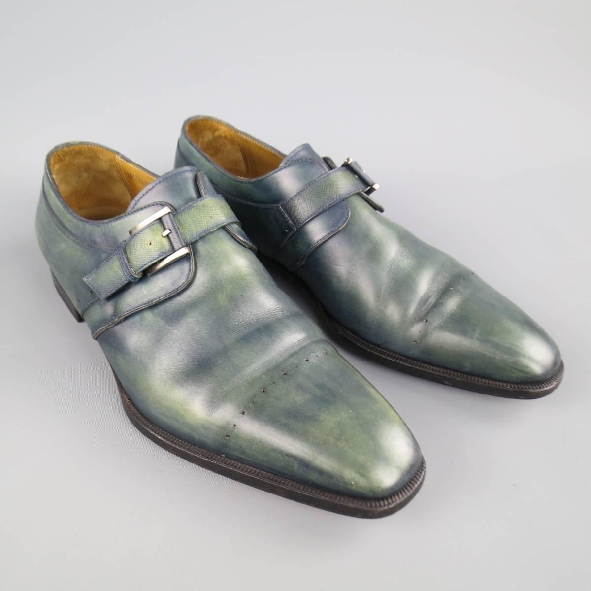 STEFANOBI dress shoes in a uniquely dyed teal green blue toned leather featuring a squared off pointed toe, perforated toe cap seam, and single monk strap closure. Made in Italy.
 
Excellent Pre-Owned Condition.
Marked: UK 10.5
 
Outsole: 12 x 4.45